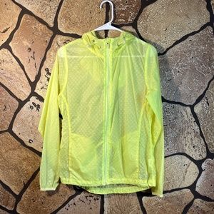 Transparent neon yellow rain jacket activewear techno streetwear has mark